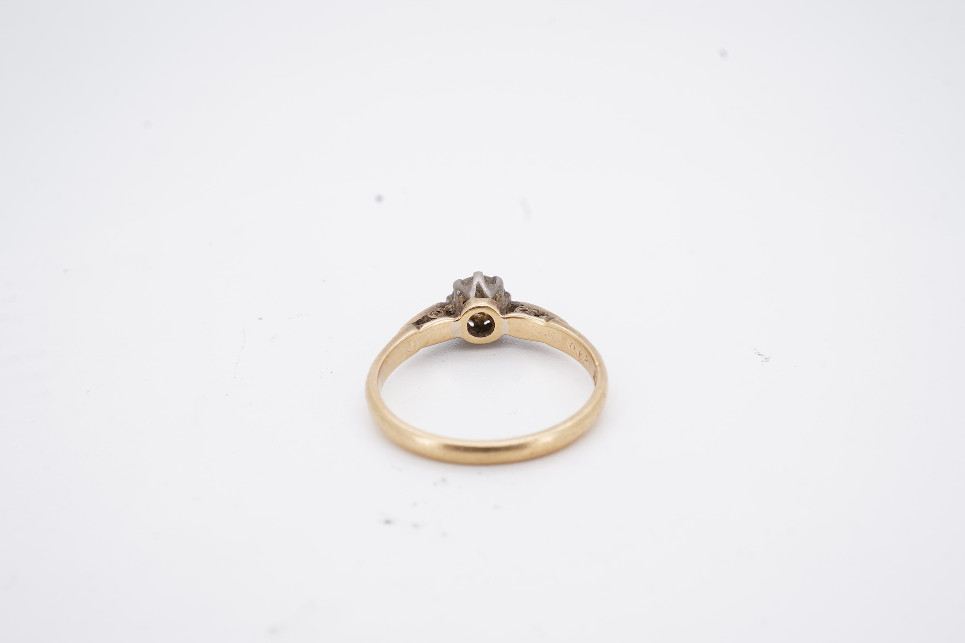 An 18ct and solitaire diamond set ring, the stone weighing approximately 0.30ct, size N, gross weight 2.8 grams.